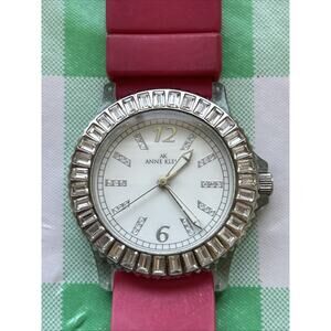 Anne Klein Silver Tone Rhinestone Bezel Pink Band Women’s Quartz Watch